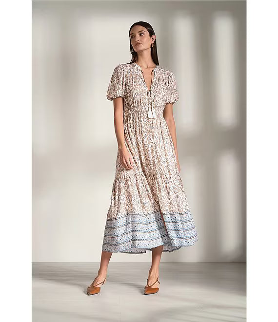 Woman wearing a neutral floral dress