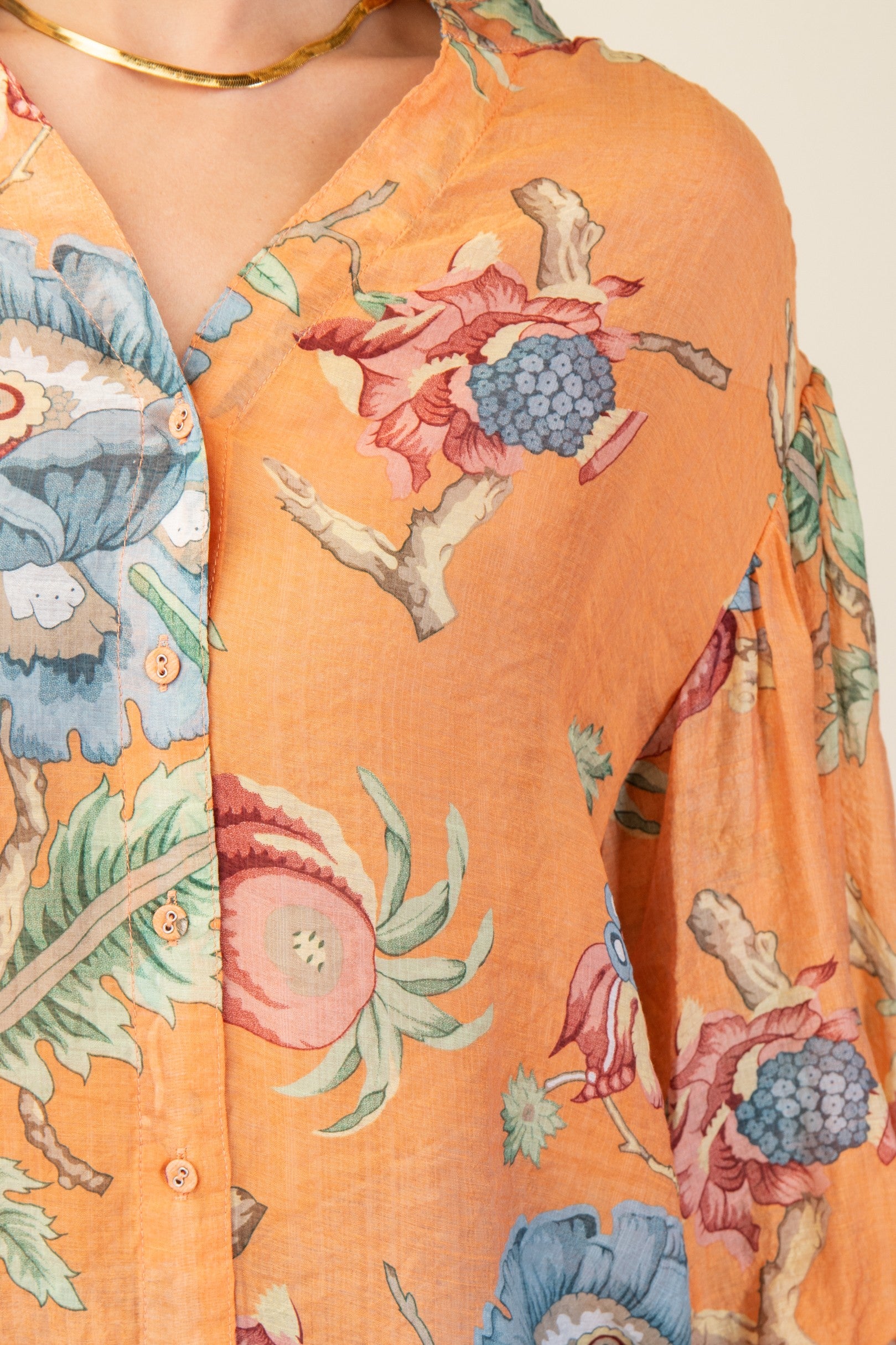 Close-up of a printed top with balloon sleeves