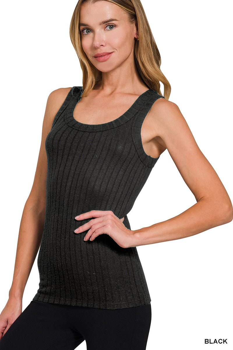 Woman wearing a black ribbed tank top