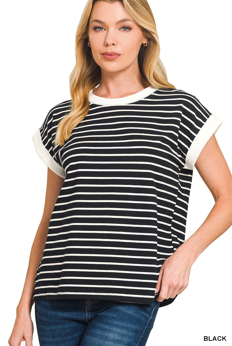 woman wearing a white and black stripe t-shirt.