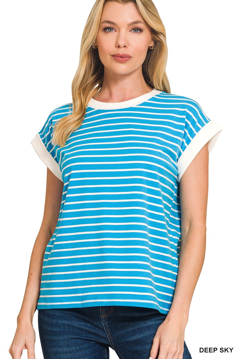 woman wearing a white and blue stripe t-shirt.