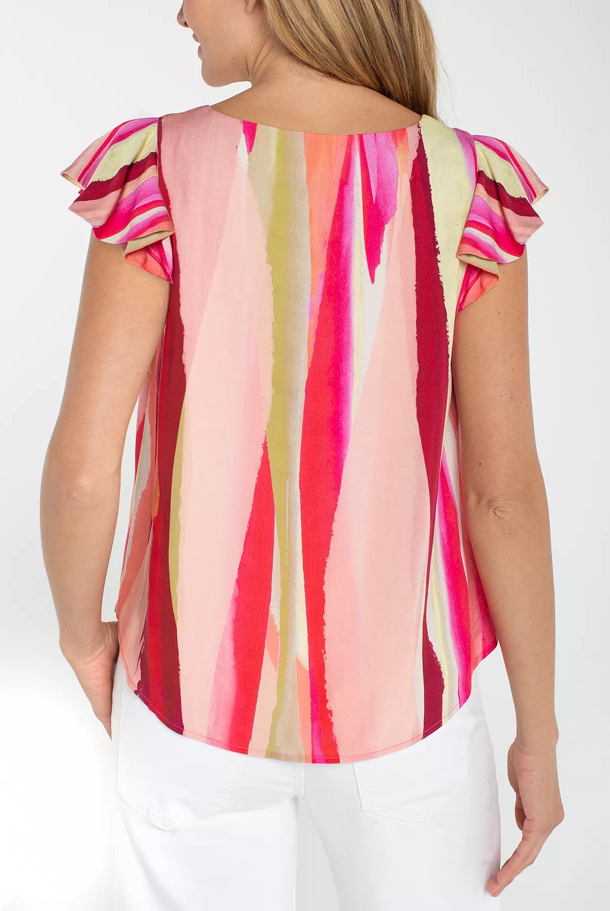 Woman wearing a colorful striped shirt