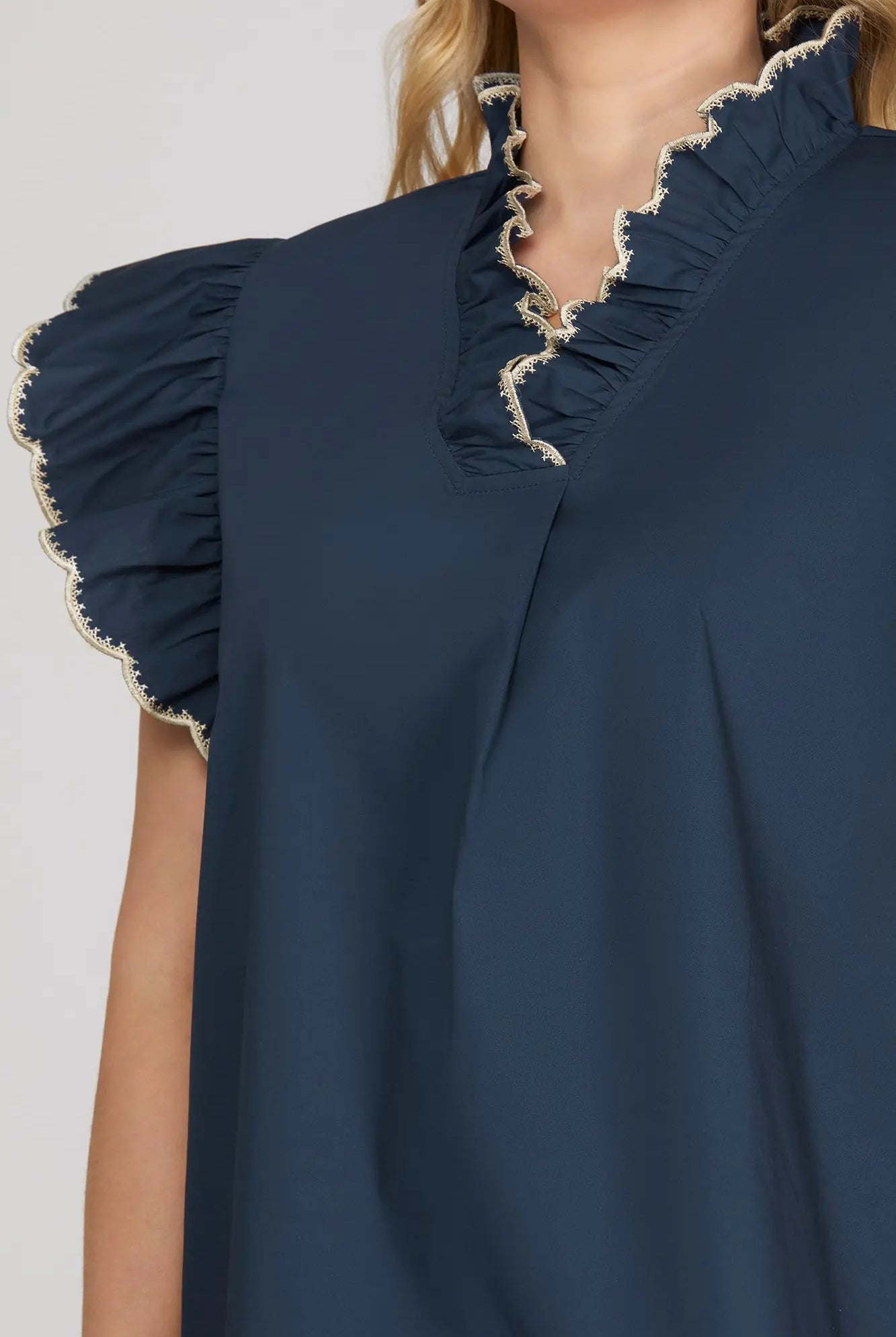 Navy blue top with ruffled sleeves