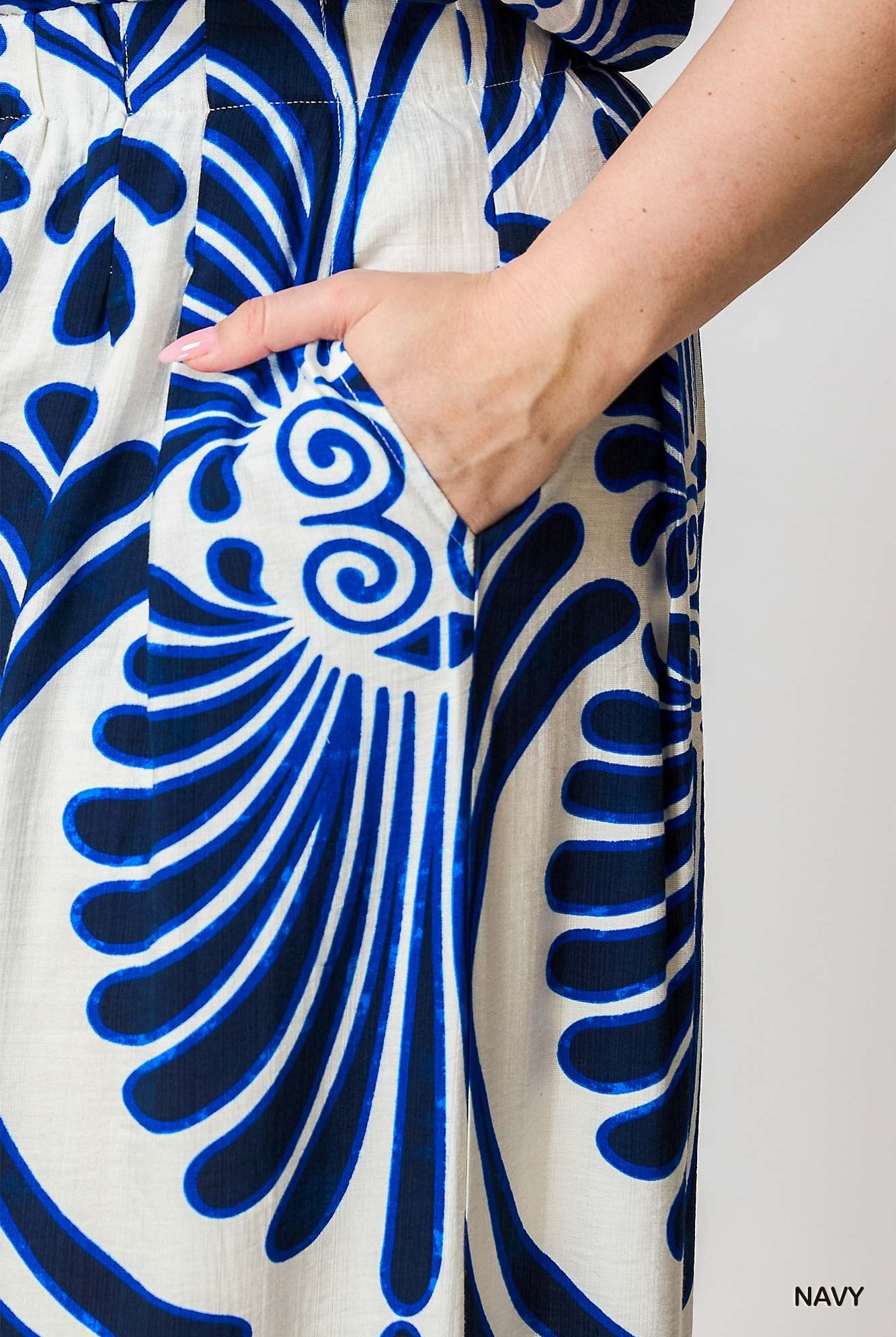Close-up of a blue and white patterned palazzo with pocket