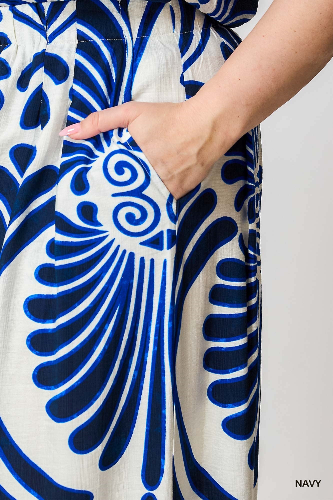 Close-up of a blue and white patterned palazzo with pocket