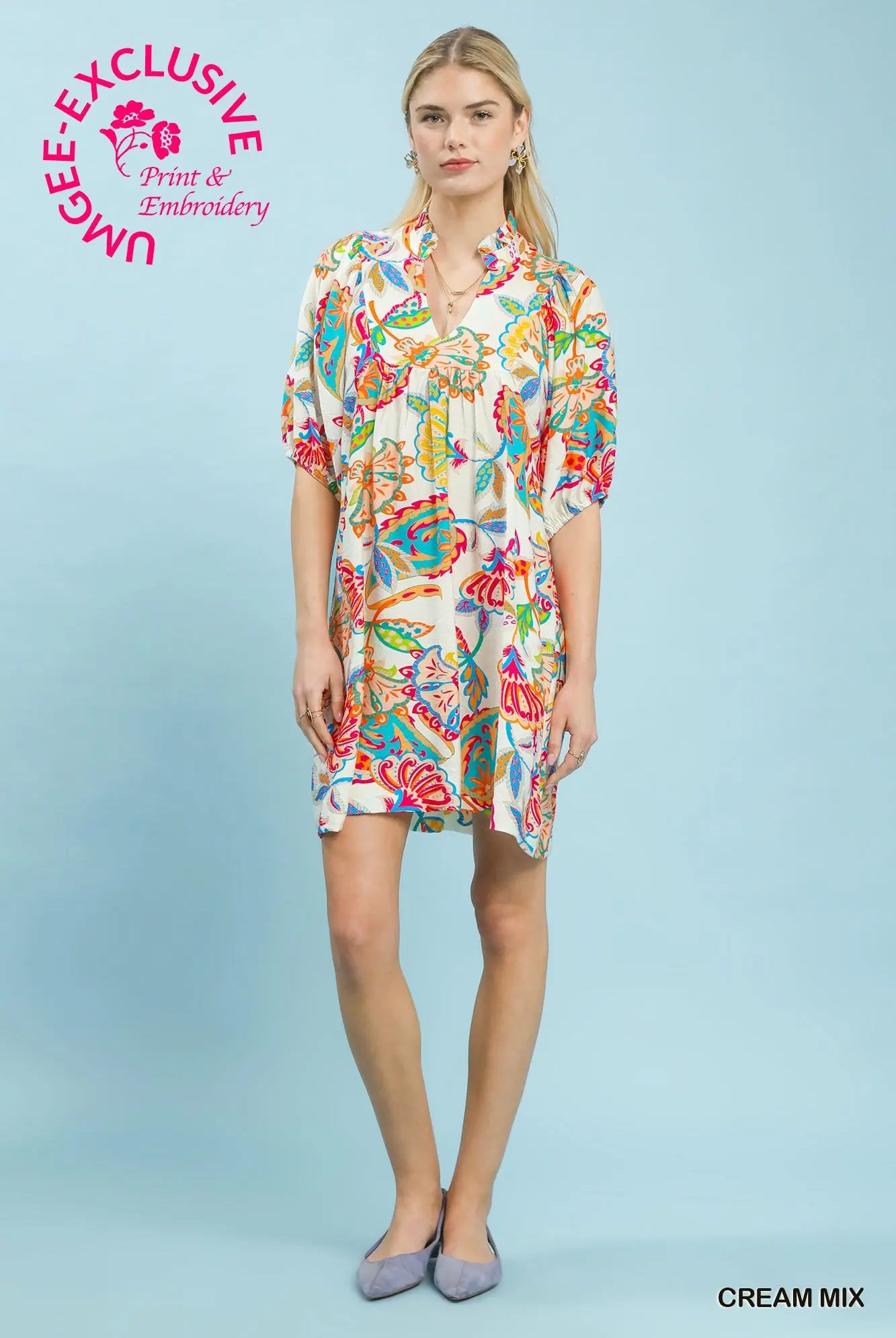 Woman wearing a paisley print dress