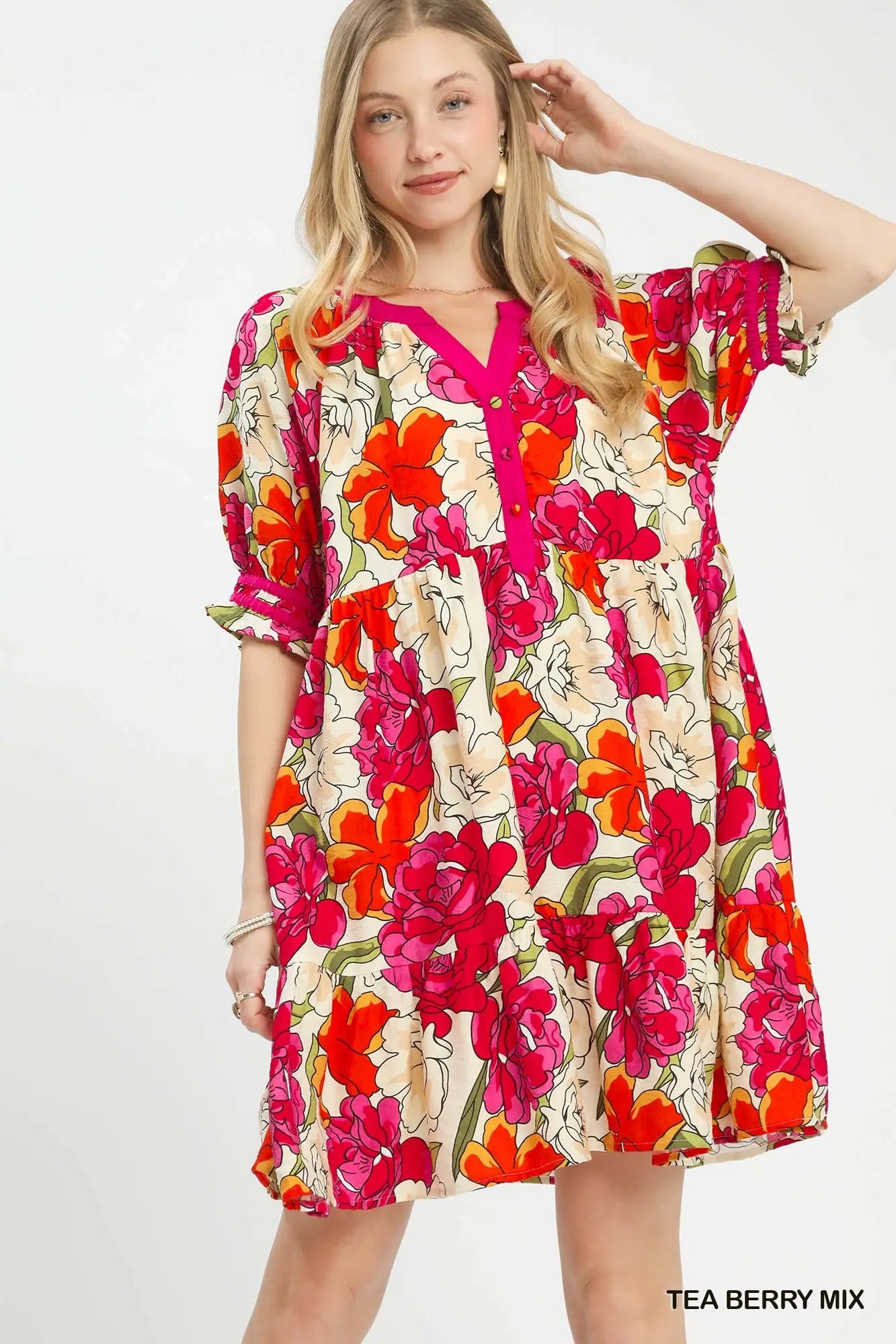 Woman wearing a floral tiered babydoll dress