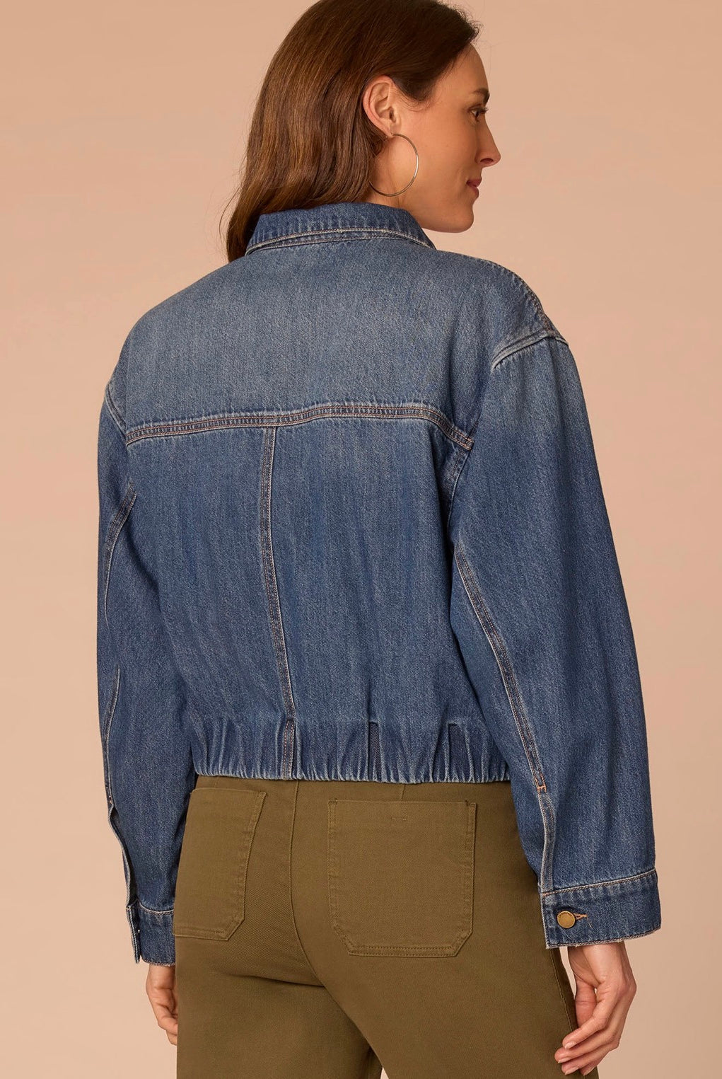 Back view of lady wearing jean jacket