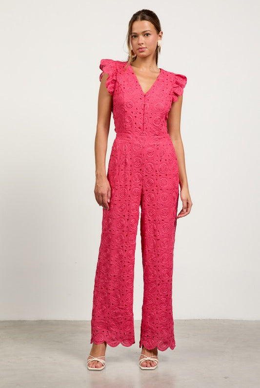 Women wearing raspberry colored lace jumpsuit
