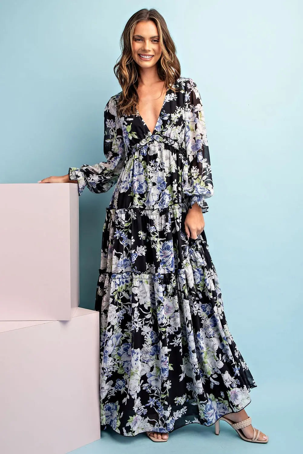 Model wearing Long sleeve floral dress with nude heels