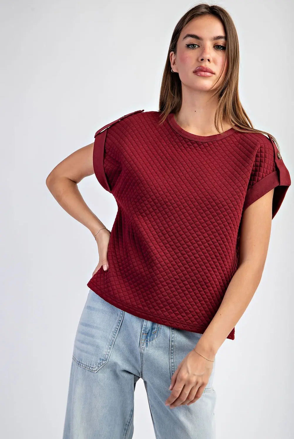 Textured maroon shirt with light jeans