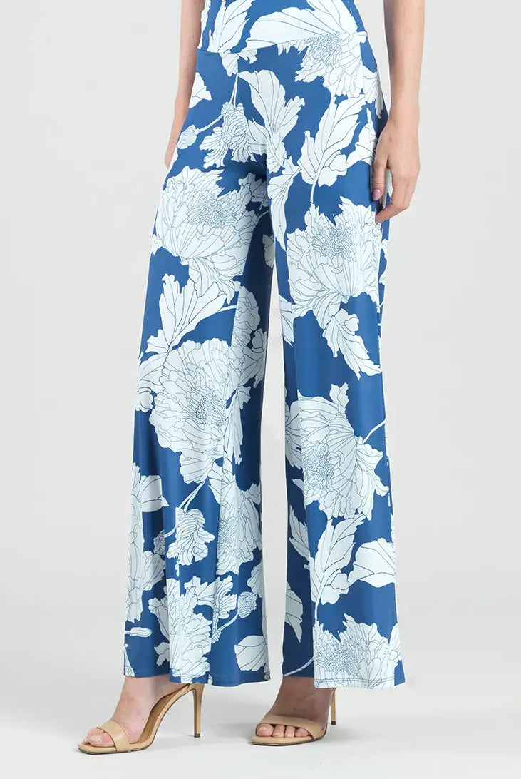 Side view of blue Palazzo pants with white flowers
