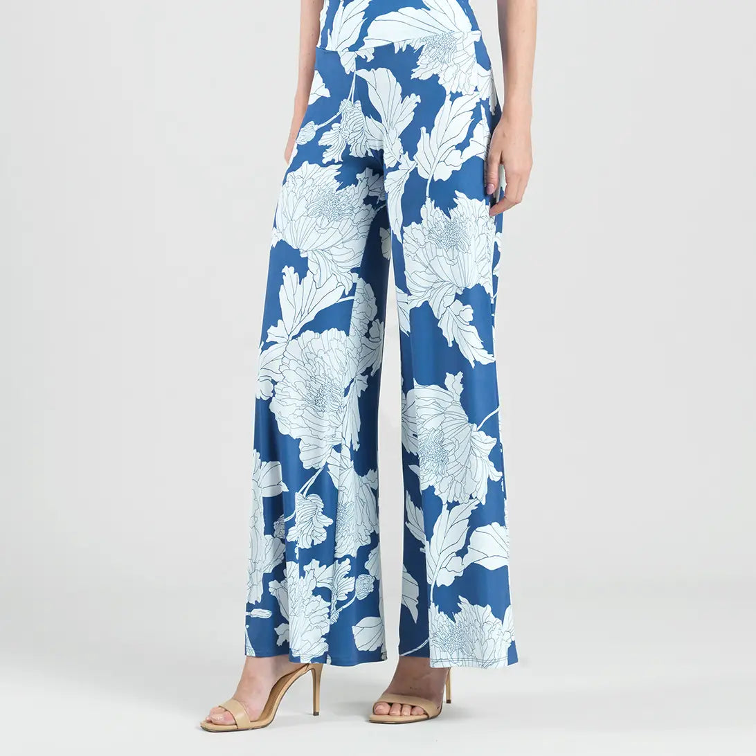 Side view of blue Palazzo pants with white flowers