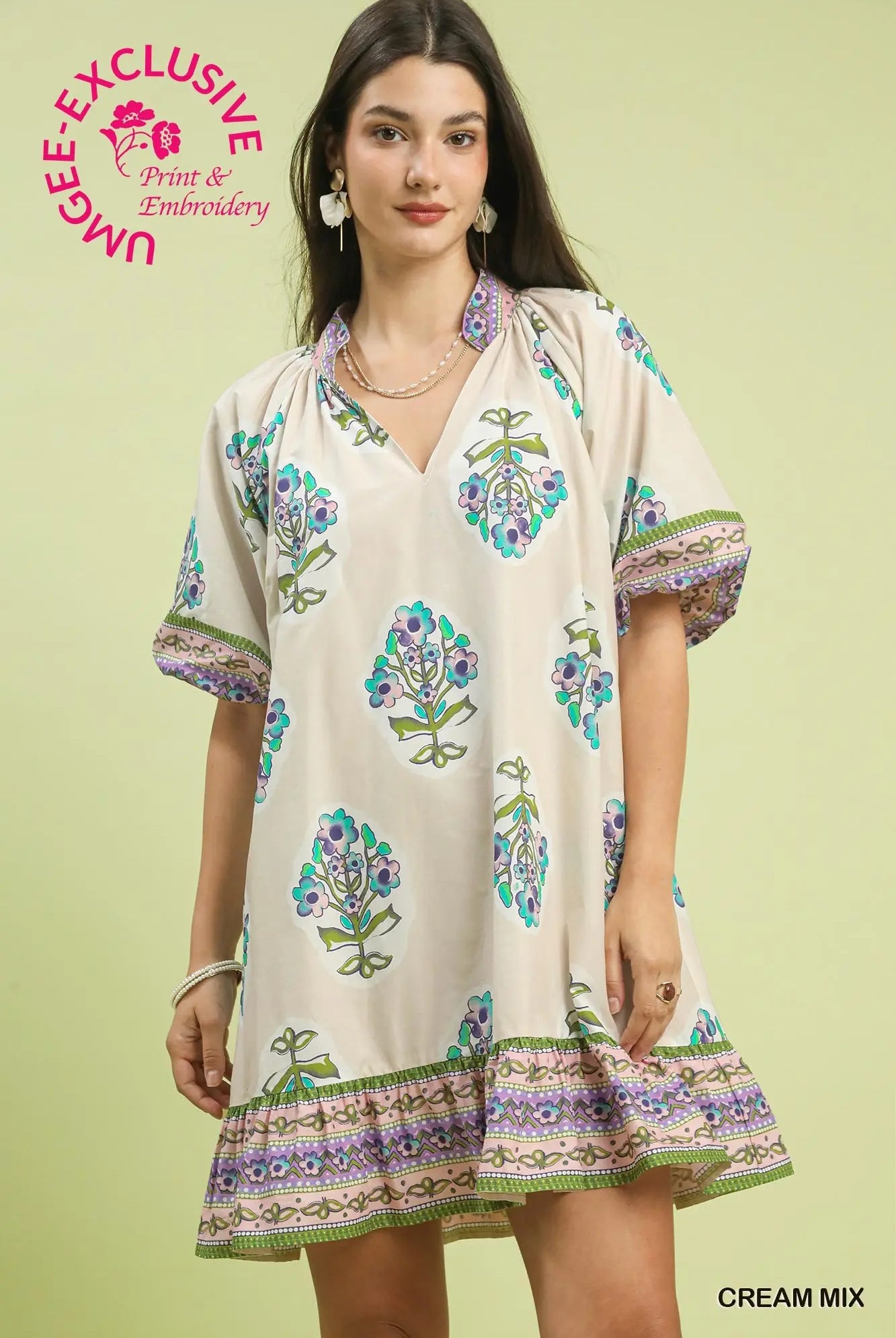 Woman wearing a flower v-neck printed dress