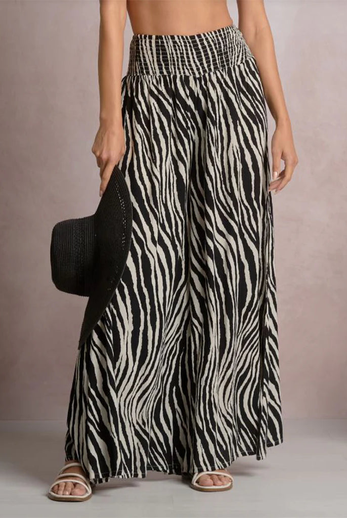 woman wearing zebra print pants