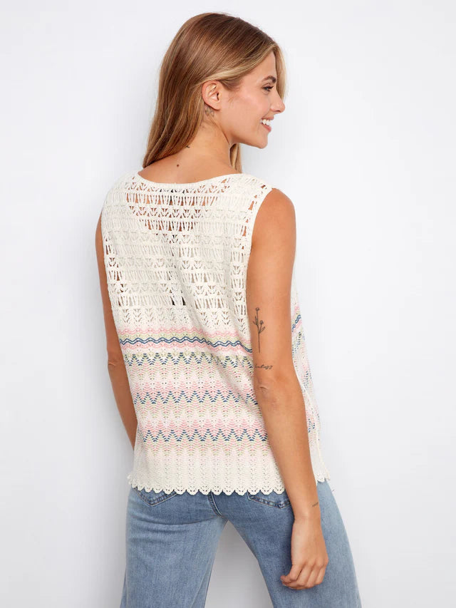 Woman wearing a sleeveless crochet top