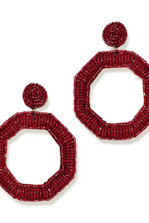 GARNET EARRINGS ON A WHITE BACKGROUND