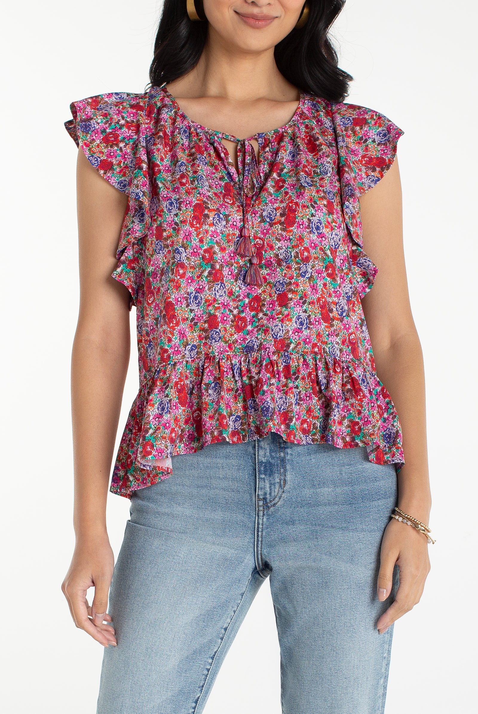 Woman wearing a colorful floral blouse