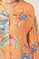 Close-up of a printed top with balloon sleeves