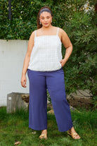 Woman wearing a white lace top