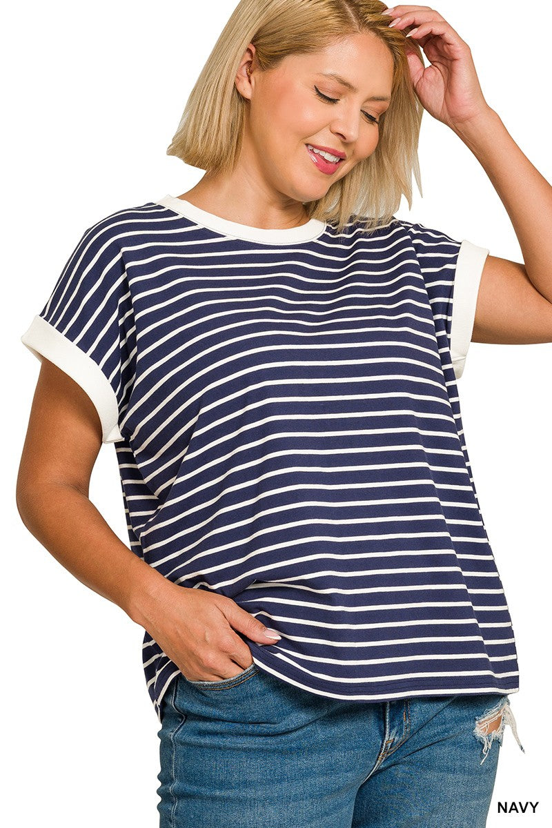 Woman wearing a navy and white striped t-shirt 