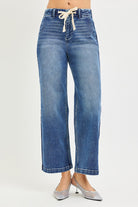 Blue jeans with a tie waist 