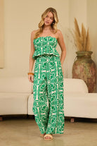 Woman wearing a green print jumpsuit