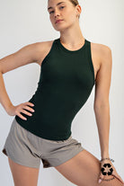 Woman wearing a green tank top 
