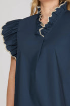 Navy blue top with ruffled sleeves