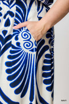 Close-up of a blue and white patterned palazzo with pocket  