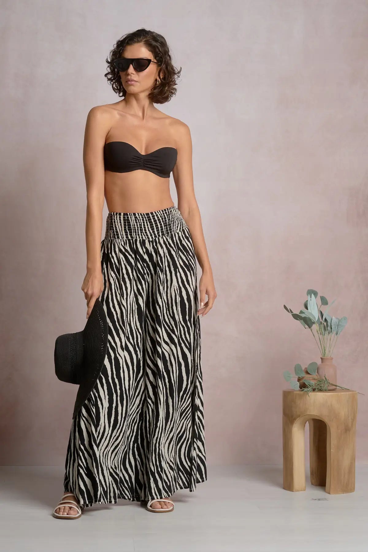 Woman wearing zebra print pants 