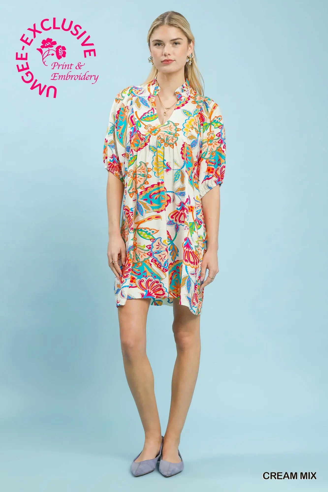 Woman wearing a paisley print dress