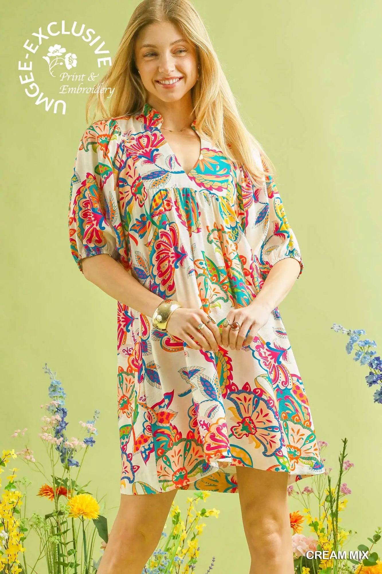 Woman wearing a paisley print dress 