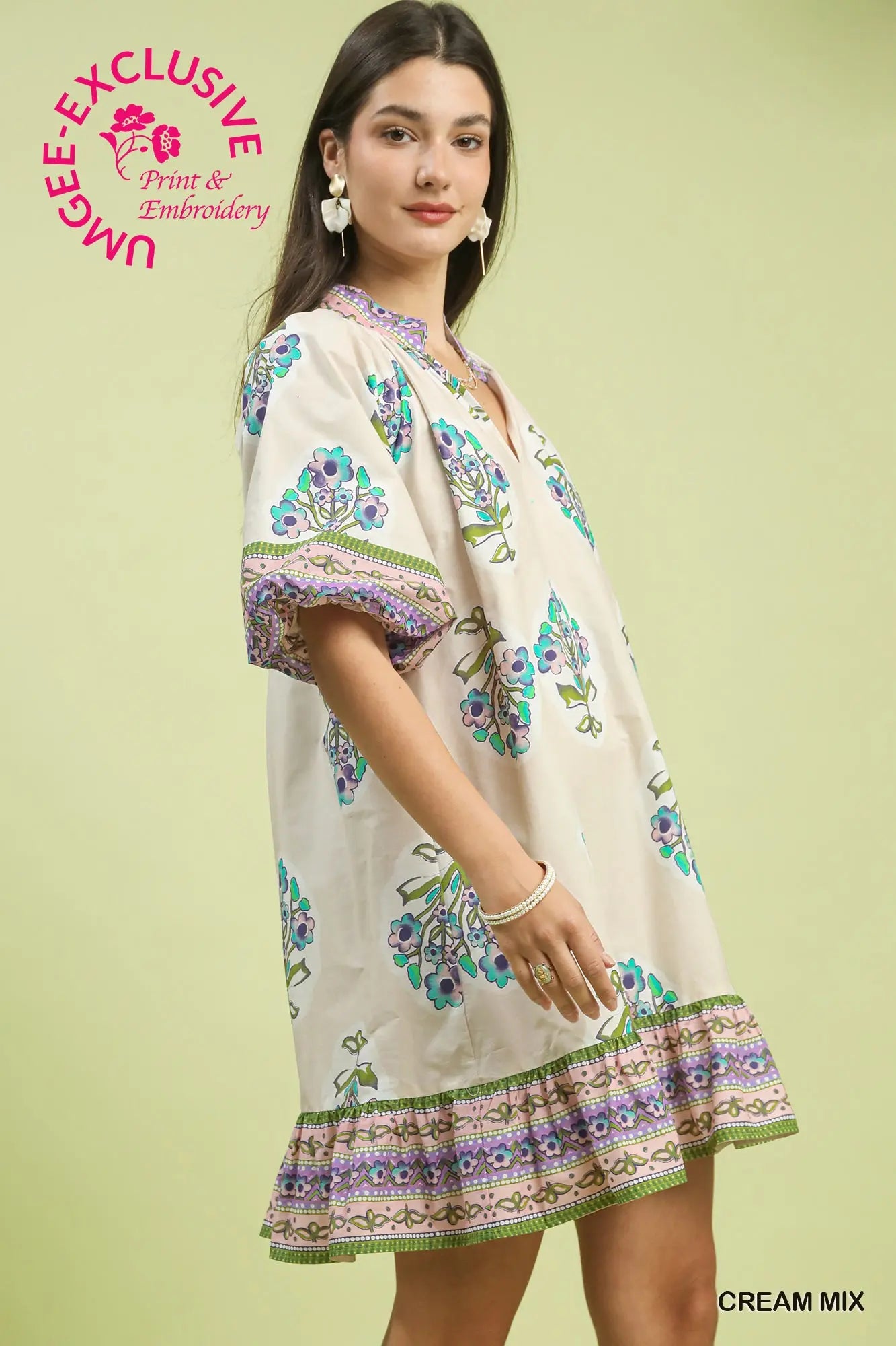 Woman wearing a flower v-neck printed dress