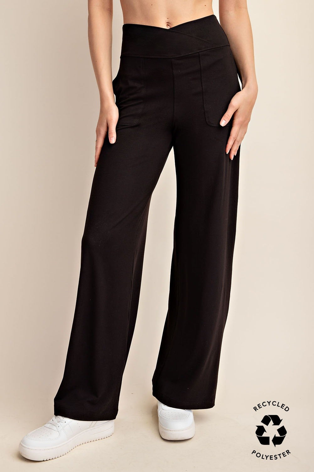 Person wearing black wide-leg pants 