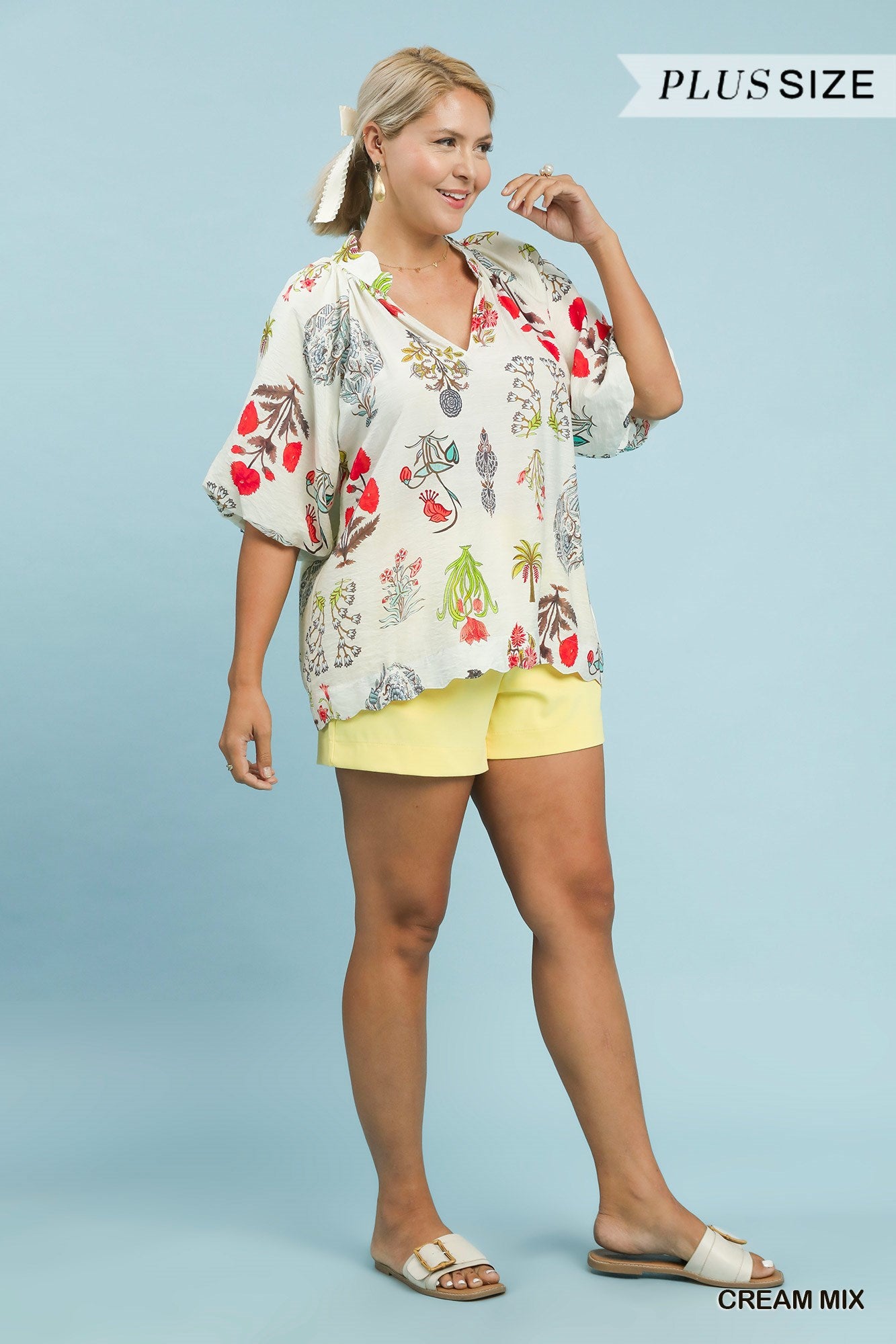Side view of Woman wearing a floral blouse 
