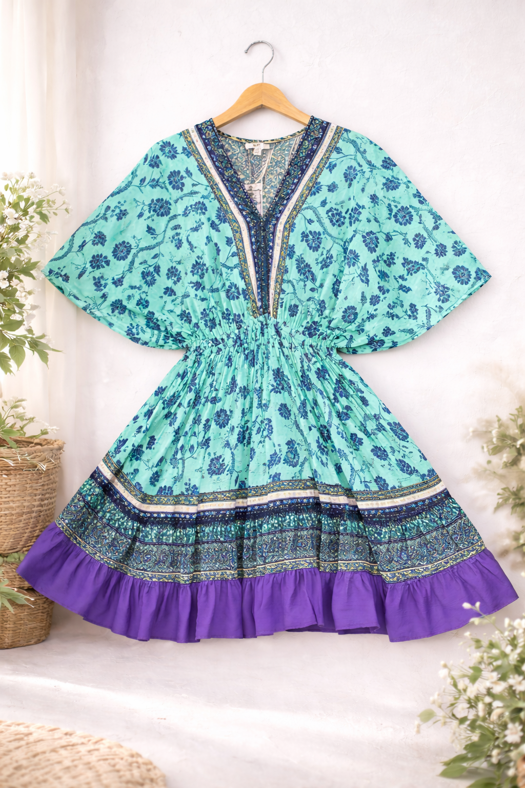 Colorful dress with floral pattern and purple bottom 