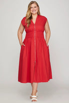 Woman wearing a red dress with a zipper 