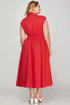 Woman wearing a red dress back view