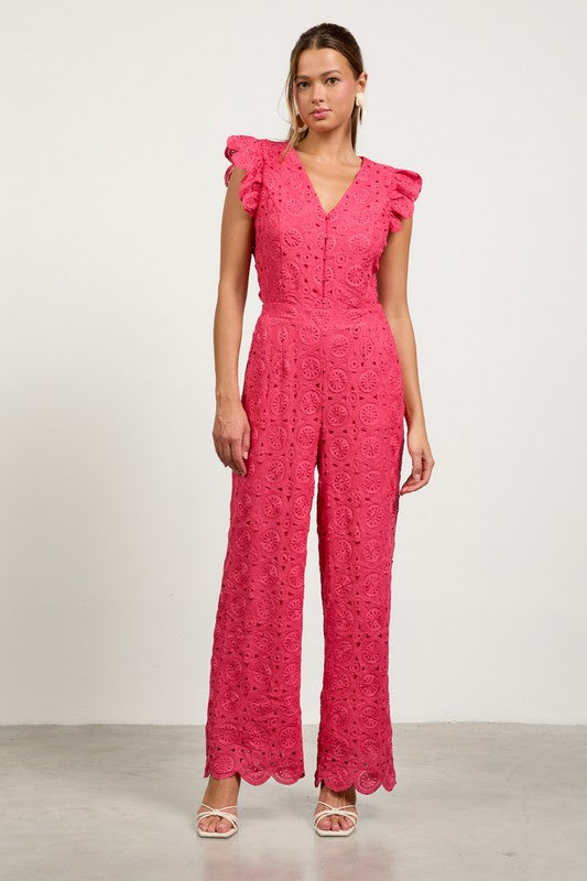 Women wearing raspberry colored lace jumpsuit