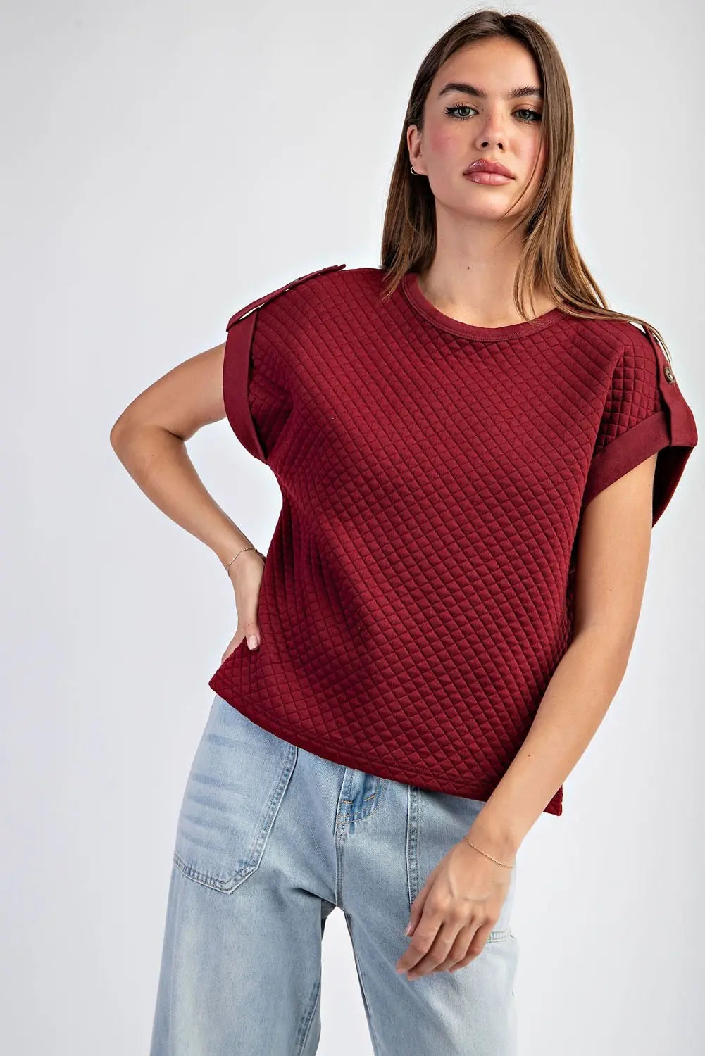 Textured maroon shirt with light jeans