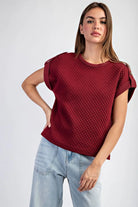 Textured maroon shirt with light jeans
