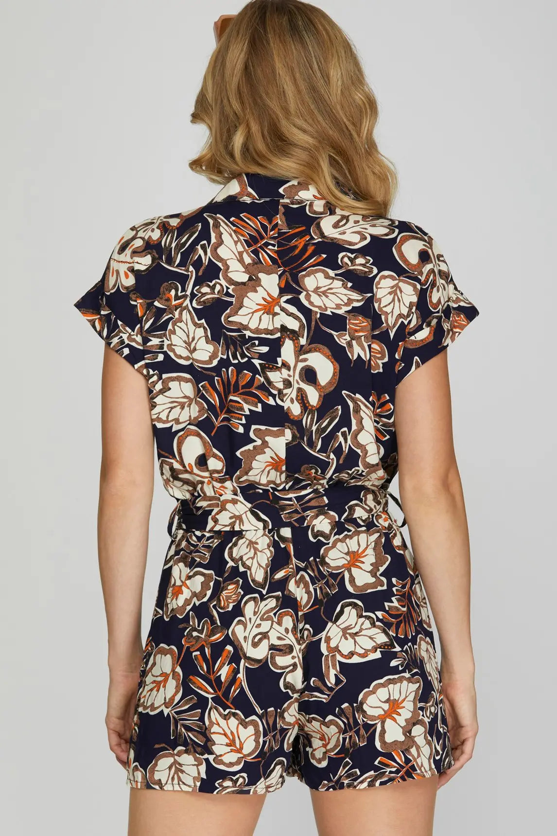 Back view of Navy floral romper
