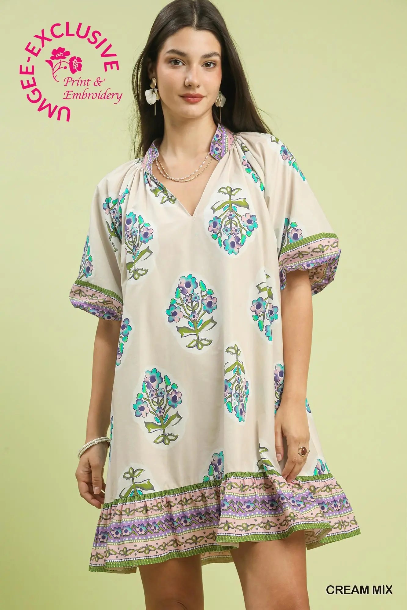 Woman wearing a flower v-neck printed dress