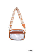 Clear pouch with brown leather accents and a patterned strap on a white background