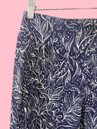 Navy blue pants with white floral pattern 