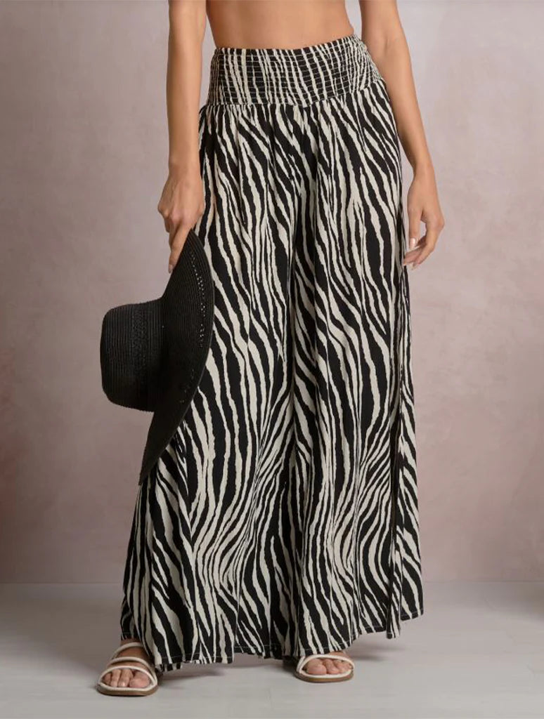 woman wearing zebra print pants 
