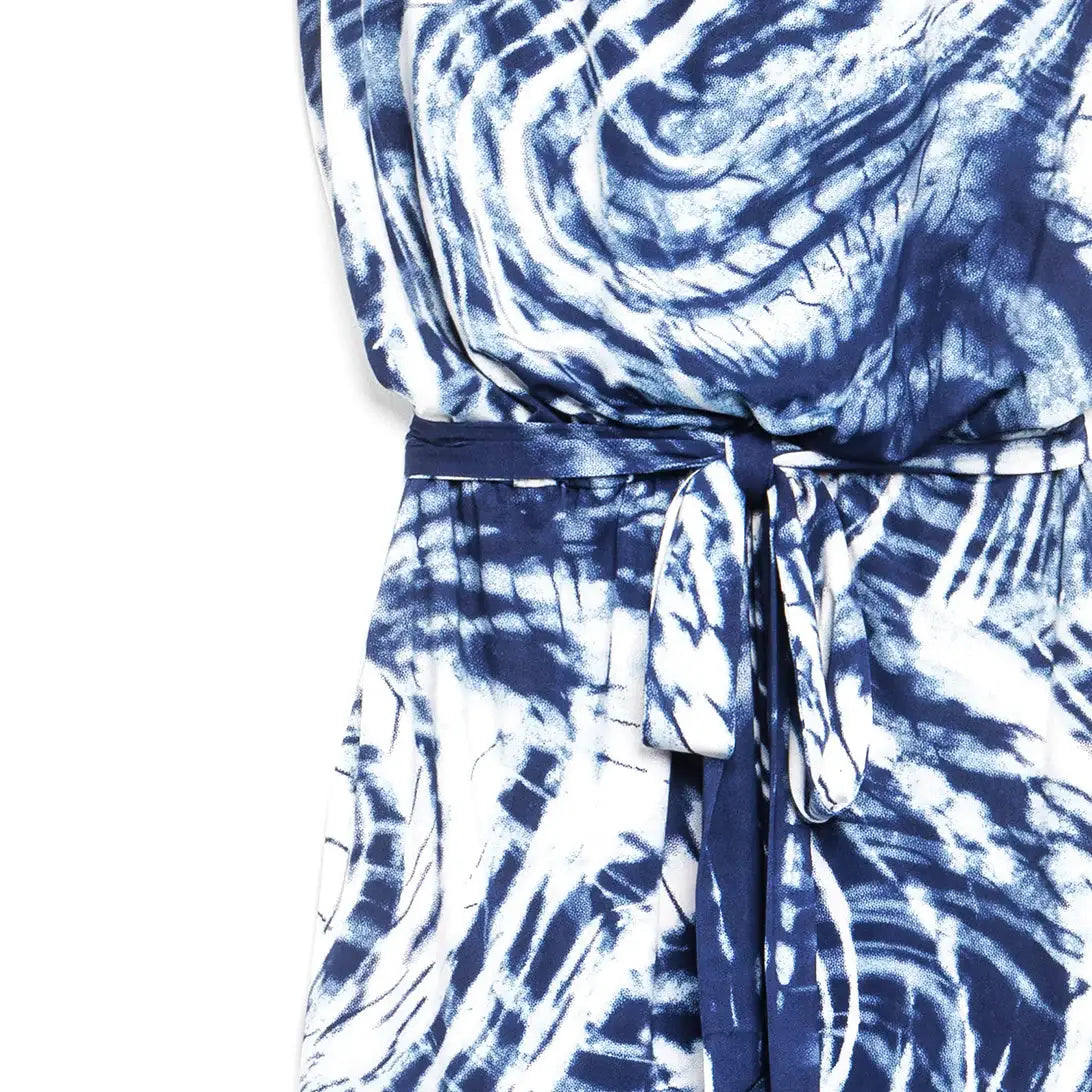 Close-up of a blue and white tie-dye patterned garment with a matching waist tie belt, shown against a plain white background.
